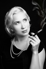 Retro Woman Portrait with cigarette in vintage image
