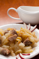 Fried potatoes with meat