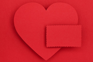 red paper heart and blank card