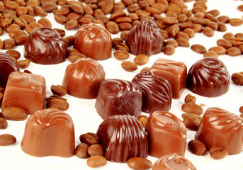 sweet chocolate candies and coffee beans