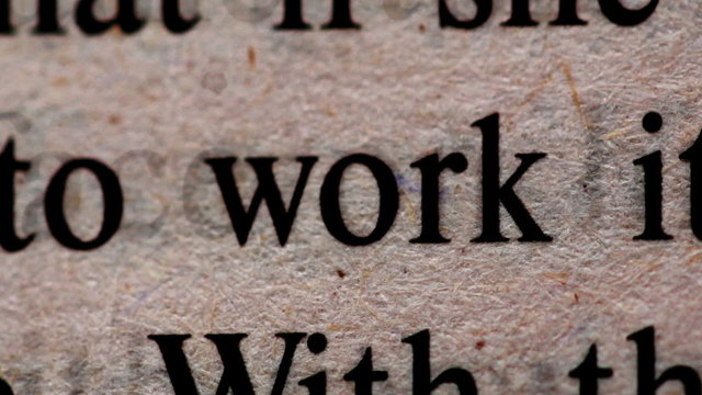 Text moves on a paper very close up