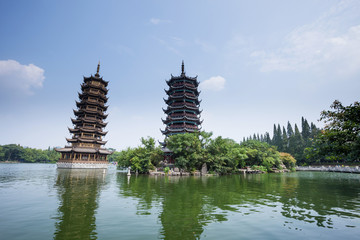 Banyan Lake Pagodas, Guilin, China ,one represents the sun,