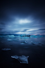 iceberg and ice at jokulsarlon lake - obrazy, fototapety, plakaty