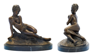 Antique bronze figurine of the naked woman.