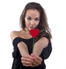 Beautiful woman handle red heart