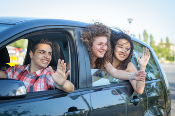 Boys and Girls in a Car Leaving for Vacation