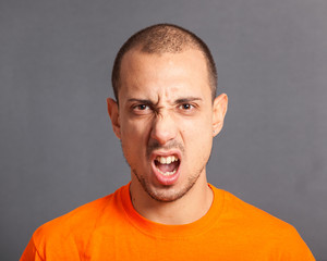 Young Man Portrait on Grey Background
