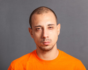 Fototapeta premium Young Man Portrait on Grey Background