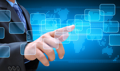businessman hand pushing button on a touch screen interface