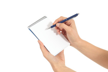 Woman hands writing on a notebook