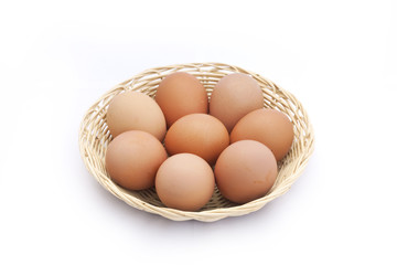 Brown eggs in bamboo basket