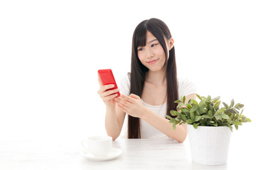 attractive asian woman using smart phone