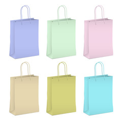 Six empty shopping paper bags in pastel colors