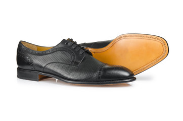 Fashion concept with male shoes on white