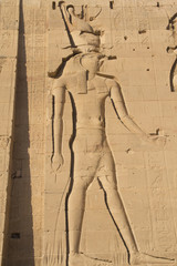 Carving of Egyptian god on pylon (Egypt)