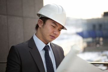 young male asian architect