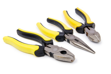 Obraz premium Yellow pliers isolated on the white