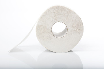 Roll of toilet paper with reflection, side shot