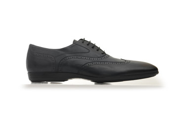 Fashion concept with male shoes on white