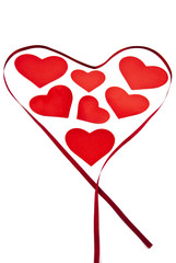 Valentine hearts surrounded by a ribbon.