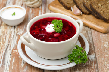 Ukrainian and russian national red borsch with sour cream