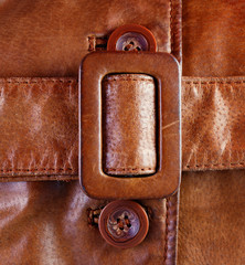 Fragment of brown leather jacket belt - 48557693