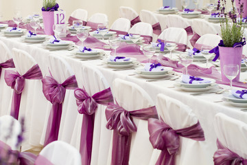 wedding or another event party table set with flower decoration