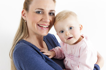portrait of mother with her baby girl