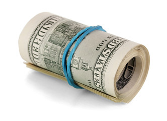 Twisted bundle 100 dollar bills isolated on white