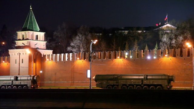 motorcade ride by quay of Moscow Kremlin at night