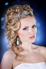 Fototapeta premium fashion portrait of a beautiful girl with crown