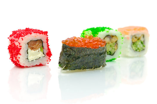 Different sushi rolls on a white background