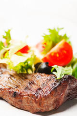 Grilled steak with vegetables