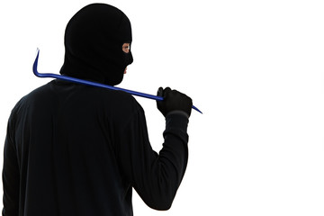 thief burglar with metal crowbar