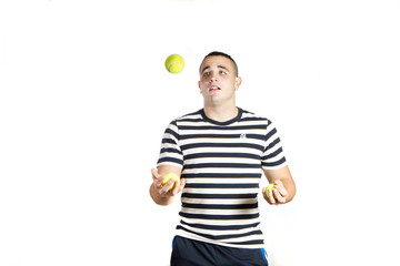 Young man juggling