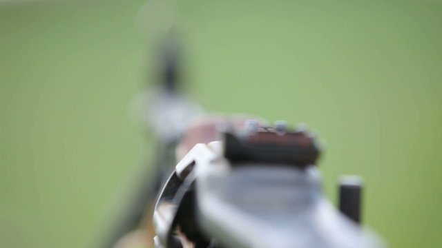 Close-up on automatic rifle