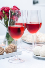 glass of rose wine in the foreground