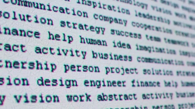 Projection of black color words move on light wall