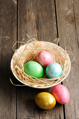 Colored easter eggs in nest