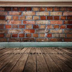 brick wall with wooden floor
