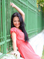 Portrait of sweet young woman enjoying at the park