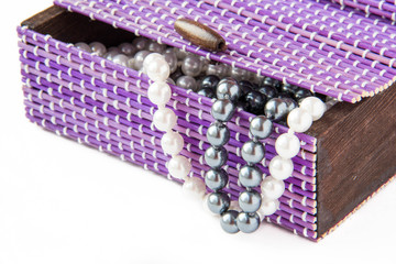 Violet casket with black and white pearls