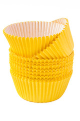 Yellow paper molds for cakes