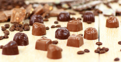 sweet chocolate candies and coffee beans