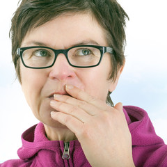 Woman eating cookie