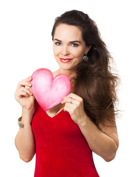 Beautiful woman holding red love heart.