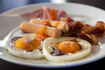 Breakfast - toasts, eggs, bacon, sausage