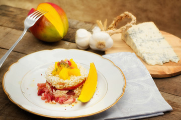 timbale of rice, mango and gorgonzola cheese