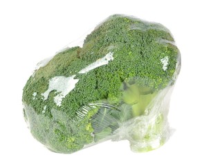 Fresh broccoli pre packed in plastic foil wrapping
