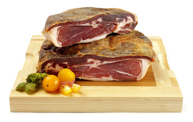 cured ham on table